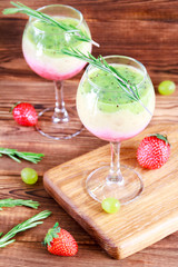 Healthy Layered smoothie made from strawberry, kiwi, bananas. Selective focus