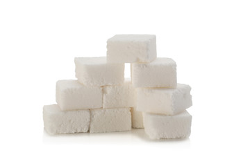 Sugar cubes on white background