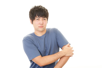 痛みを訴える男性