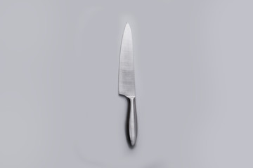 Stainless steel kitchen knife isolated over background