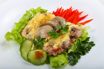 Pork steak with mushroom and cheese