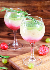 Healthy Layered smoothie made from strawberry, kiwi, bananas. Selective focus