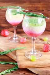 Healthy Layered smoothie made from strawberry, kiwi, bananas. Selective focus