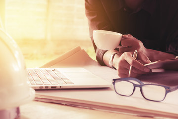 Fototapeta premium close up hand of young man working on his plane project at site