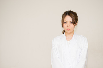 Obraz premium 医療のイメージ（医者・女性・看護婦・研究・白衣）
