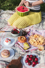 girl with watermelon on picnic