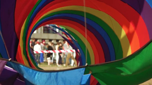 Floating multi-colored parachute