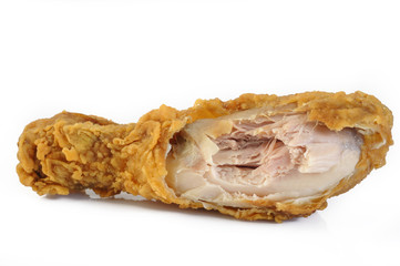 fried chicken drumsticks bite taken on white background