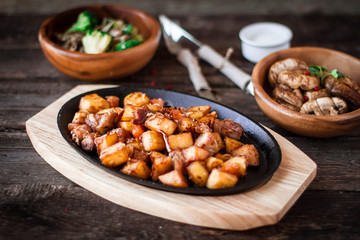 Roasted potato and meat