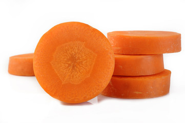 Fototapeta na wymiar Fresh sliced carrots on white background