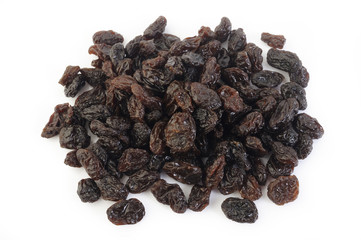 Dried raisins on white background