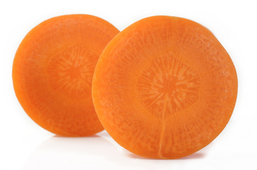 Fresh sliced carrots on white background