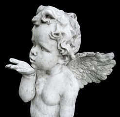 Air kissing angel statue, close up.