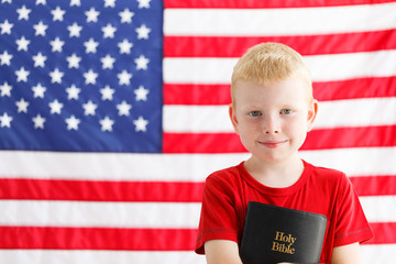 American patriotic boy with Holy Bible