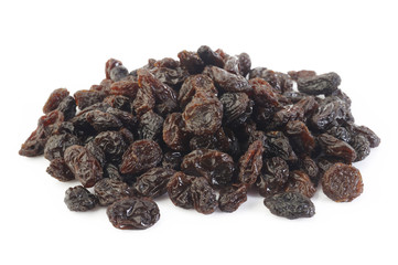 Dried raisins on white background