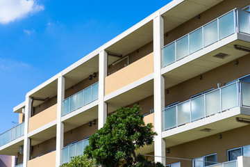 Apartment building in Japan, against blue sky
