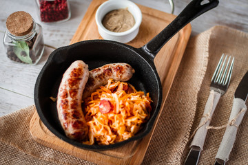 Grilled sausage with cabbage