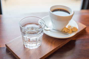 hot coffee with small biscuits