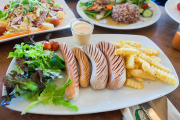 Grilled variety sausages.