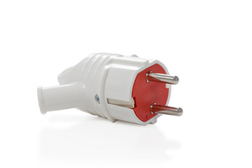 White-red electrical plug with grounding isolated on a white background