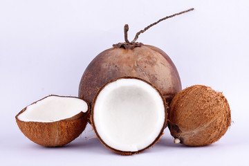 coconut half clipping path for coconut milk and brown coconut shell  on white background healthy fruit food isolated

