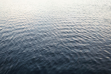 deep blue water surface of the bay