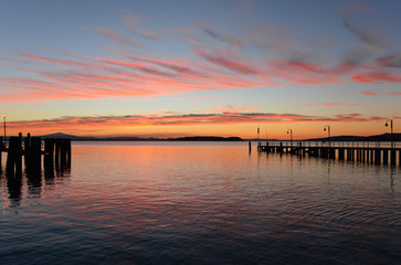 Obraz premium Trasimeno lake (Umbria, Italy) from the waterfront of the Passignano sul Trasimeno town.