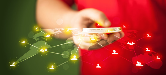 Smart man holding telephone with social media network connection