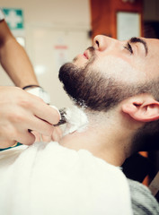 Obraz na płótnie Canvas Traditional ritual of shaving the beard