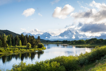 The scenic Oxbow Bend overlook in the Grand Teton National Park in Wyoming as the snake river winds around the bend and the tetons in the background. 