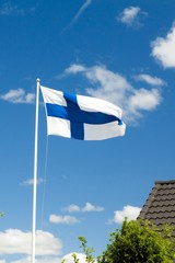 Flag of Finland on blue sky background.