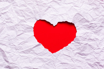 White torn paper in heart shape symbol