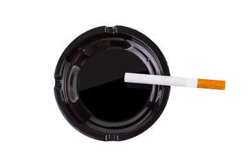 Cigarette in an ashtray isolated on white background