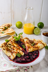 Crepes with forest berries and caramel