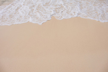 Fototapeta na wymiar Sand beach background in the tropical island