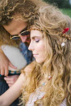 Young beautiful couple with curly hair in love