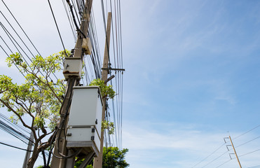 Transformer attached to a power pole.