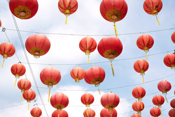 Fototapeta premium Red Chinese lanterns against blue sky at Yap Kongsi Temple in Georgetown, Penang, Malaysia