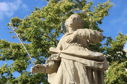 Baroque statue of the Virgin Mary on the Balthasar Neumann Square in Werneck, town in Franconia, Germany. 