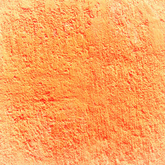 Texture orange plastered wall for background