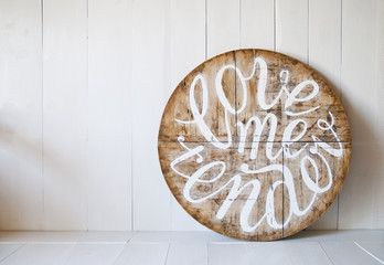 Love words.Love me tender. Letters written on wooden background 