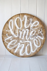 Love words.Love me tender. Letters written on wooden background 