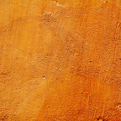 abstract orange background texture cement wall