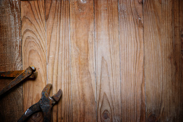 old tools on wooden background 