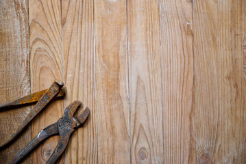 old tools on wooden background 