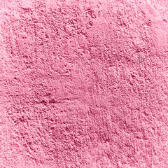 Fototapeta premium Texture pink plastered wall for background