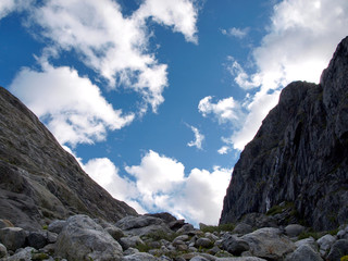 Alpine mountain glacier with sky  over the hills