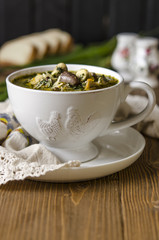 Soup with mushrooms paste offal carrots and herbs  