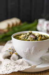 Soup with mushrooms paste offal carrots and herbs  