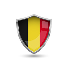 Fototapeta premium National flag of Belgium. Flag on the metal shield with glare.